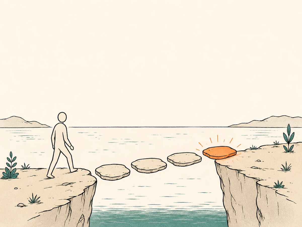 A person at the edge of a cliff, with stepping stones across the water leading to a glowing orange stone on the far side.
