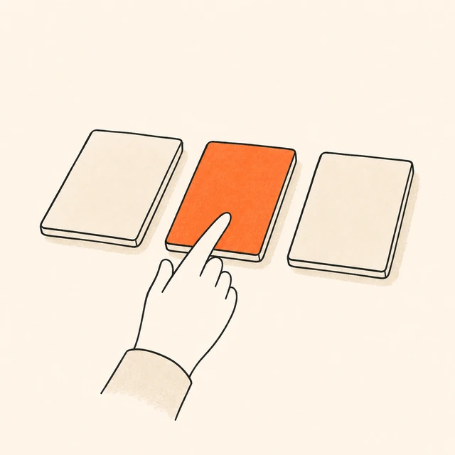 A hand pressing the middle one of three answer cards; the card being pressed is orange.